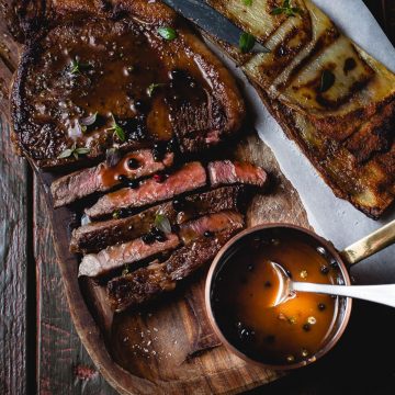 Grilled steak with peppercorn whisky sauce.