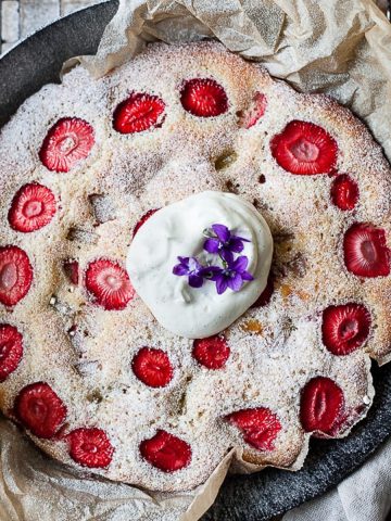 Strawberry buttermilk cake in a skillet pan.