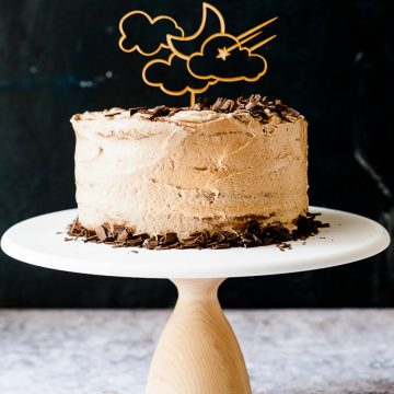 Tiramisu layer cake with chocolate shavings.