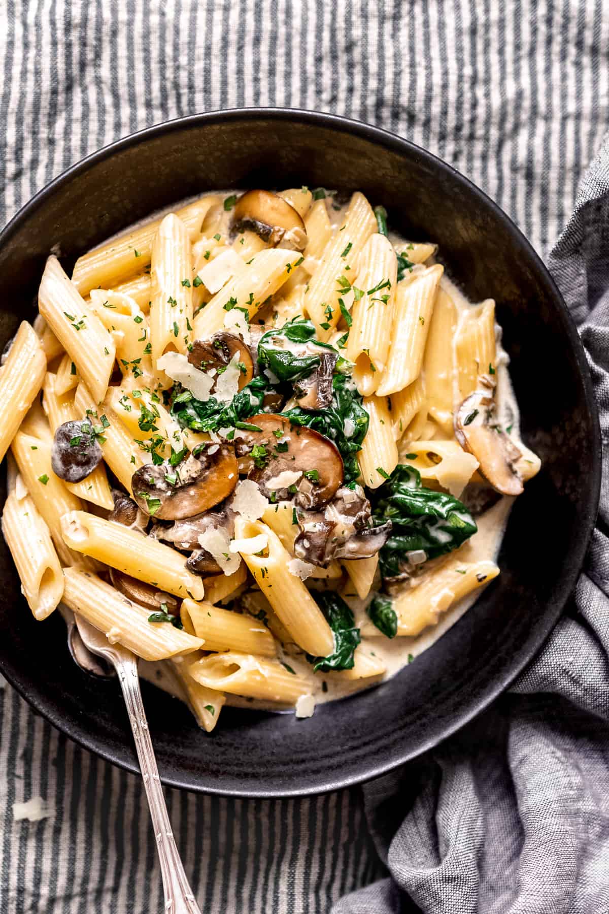 Healthy creamy mushroom pasta with cheese.