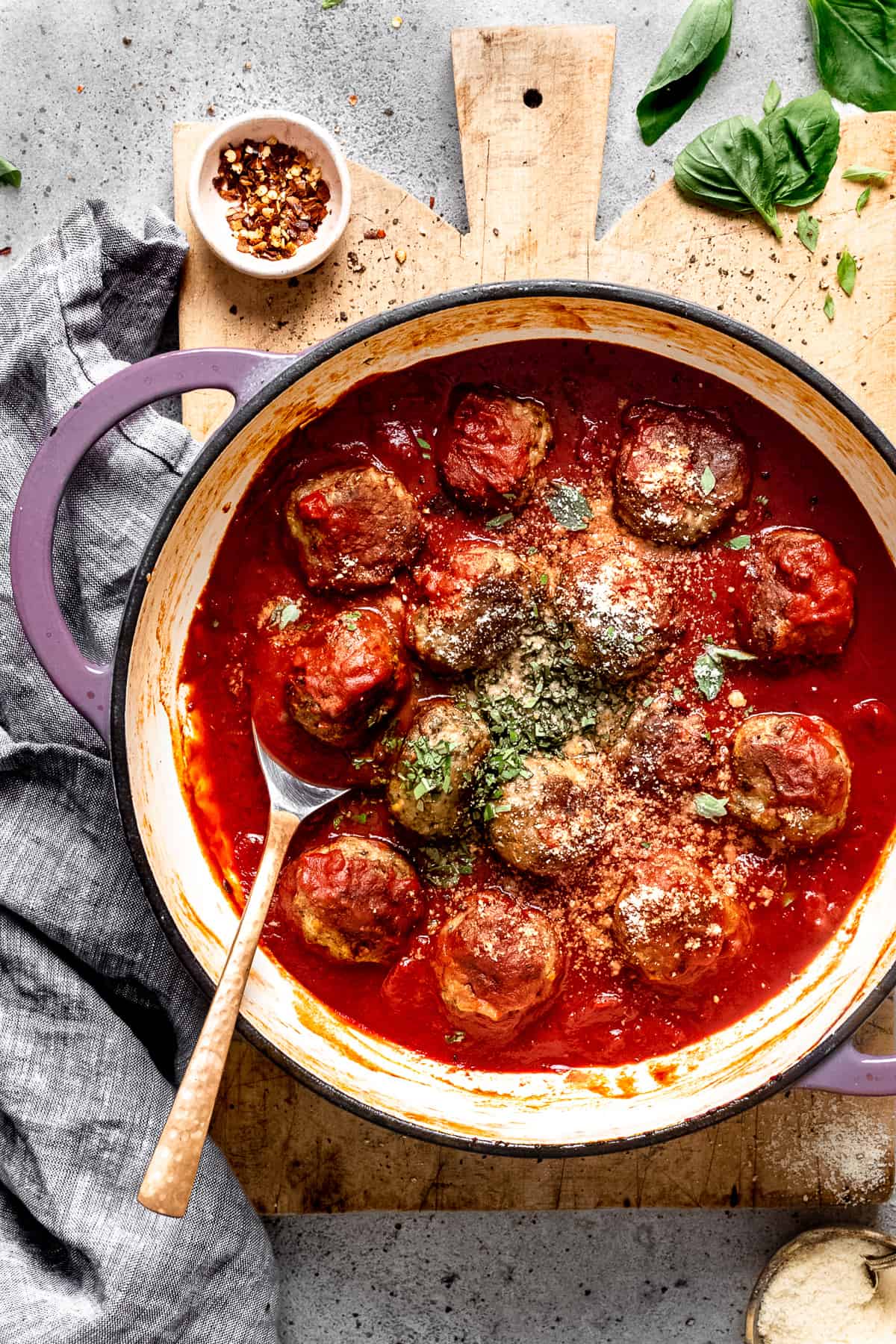 Lamb meatballs in tomato sauce with parmesan.