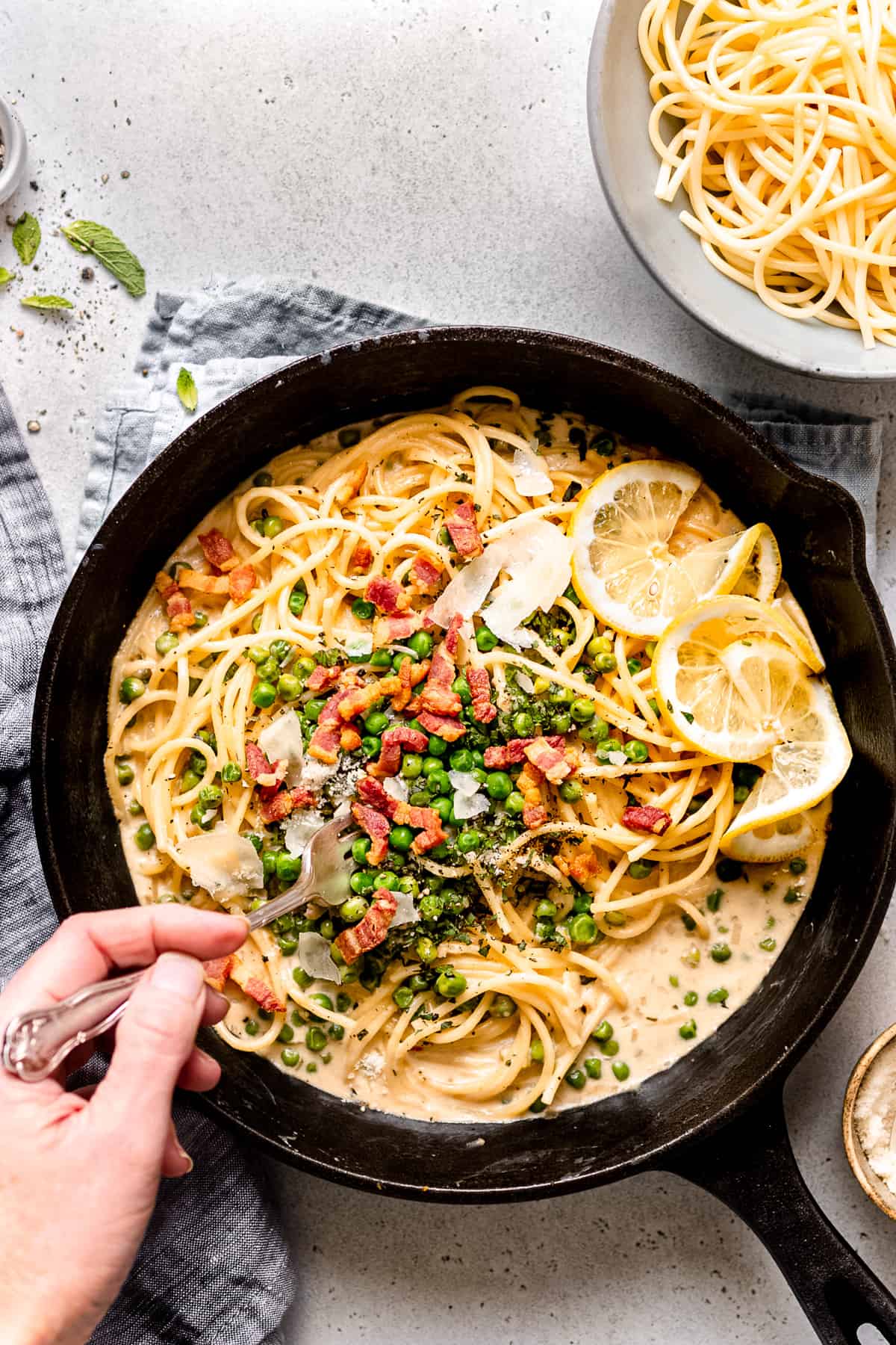 pasta with peas in a skillet.