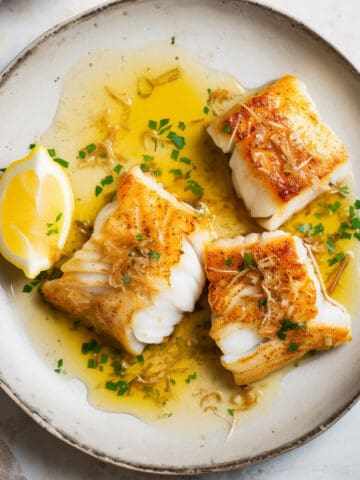 Pan fried cod in lemon butter sauce.