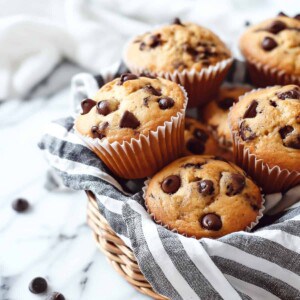 Fluffy easy banana muffins with chocolate chunks.