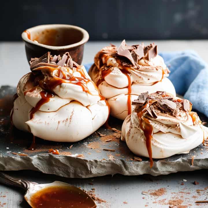 Chocolate Pavlova with caramel sauce on a baking tray.