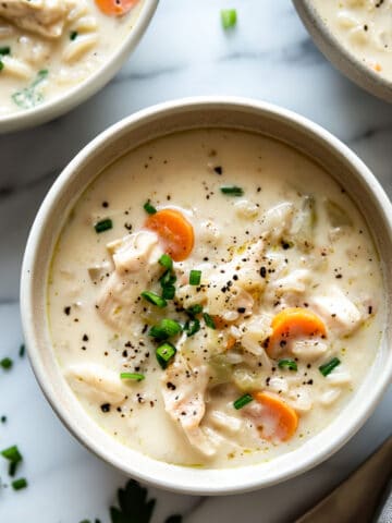Creamy chicken and rice soup with vegetables.