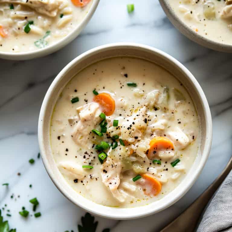 Creamy chicken and rice soup with vegetables.