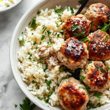 Greek chicken meatballs with feta and rice.