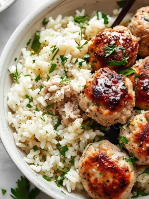 Greek chicken meatballs with feta and rice.