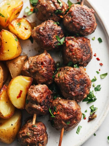 Traditional Greek meatballs-Keftedes with roast potatoes.