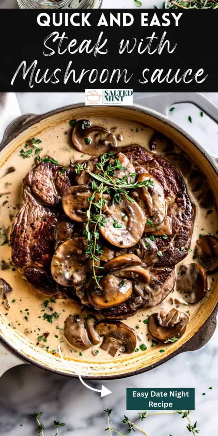 Pan-seared steak and mushrooms in cream sauce in a pan.