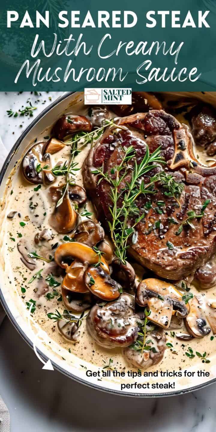 Pan-seared steak and mushrooms in cream sauce in a pan.