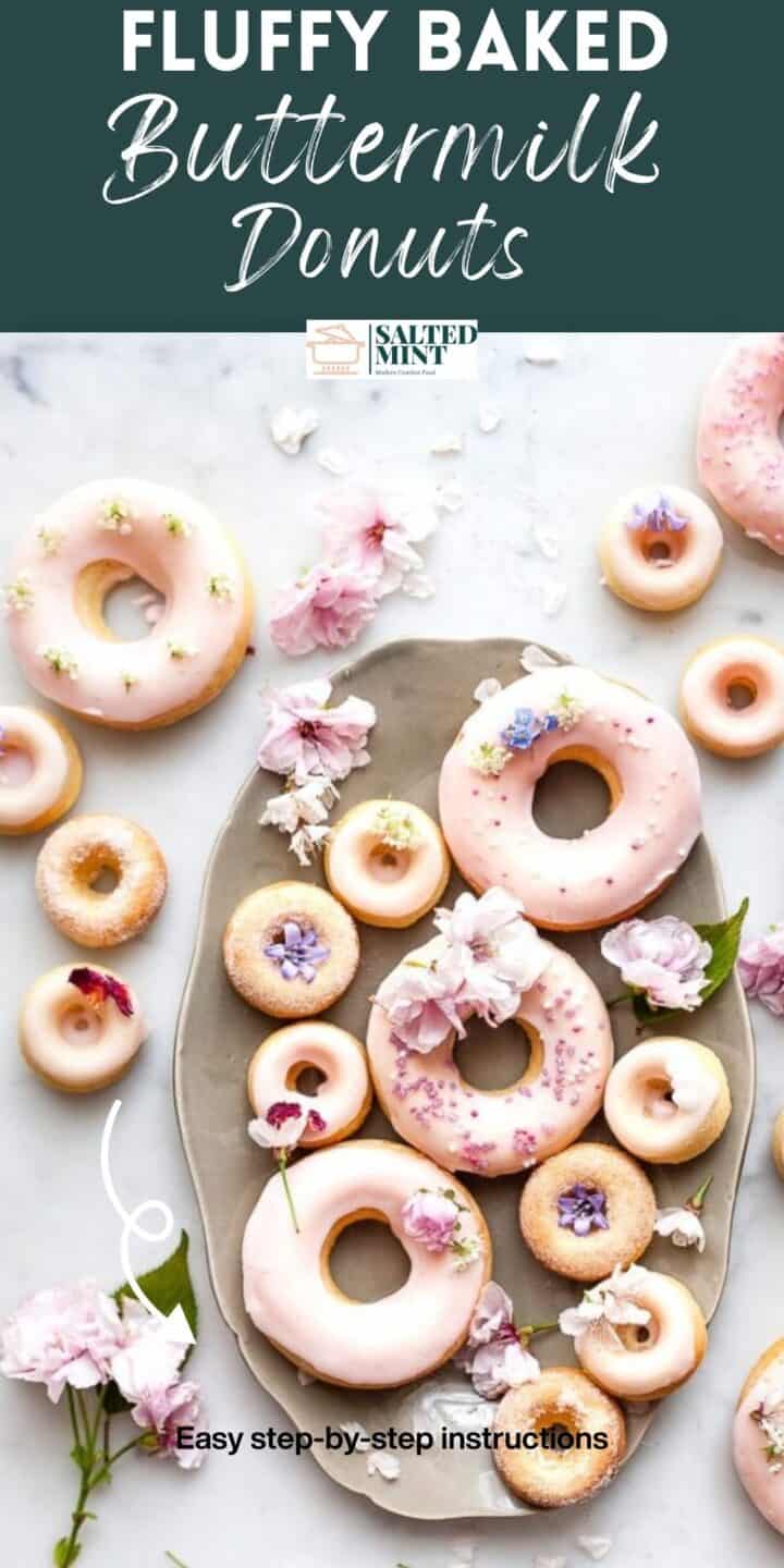 Baked donuts with buttermilk and old-fashioned glaze on a white table.