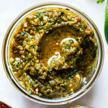 Homemade Thai green curry paste in a jar.