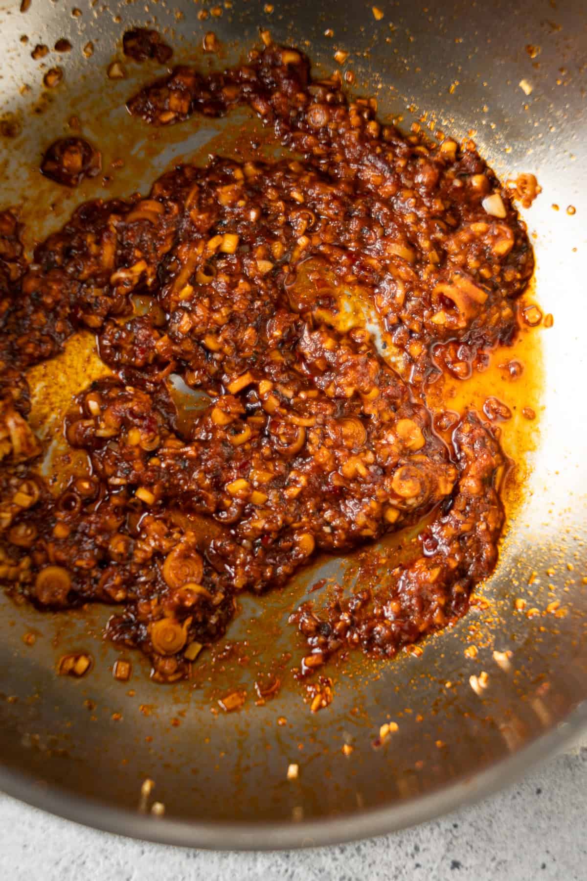 Aromatics and curry paste gently frting in the pan.